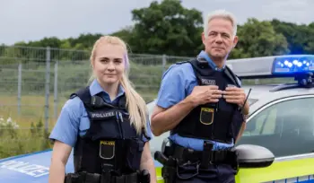 Polizeibeamter in Uniform - Dienstunfähigkeitsversicherung Polizei 2025 | Ratgeber